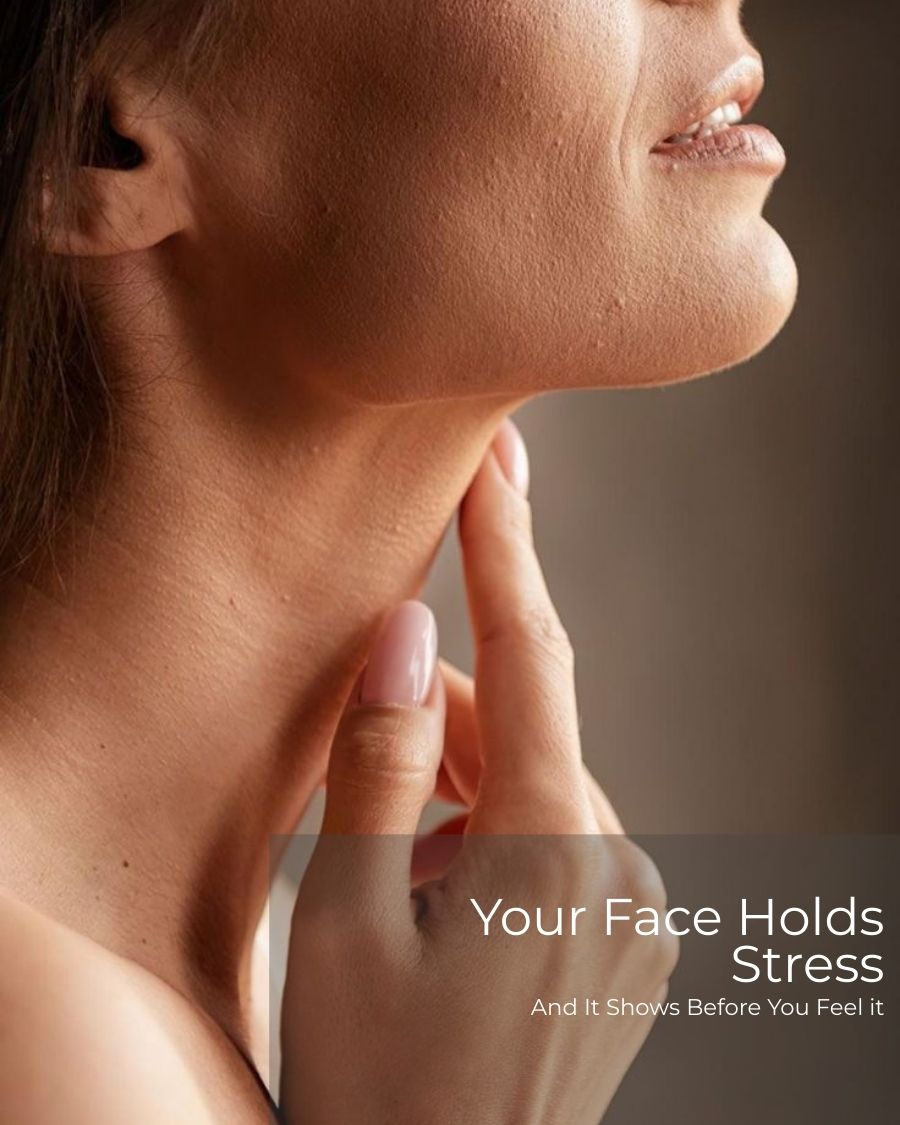 Close-up of woman touching her neck illustrating facial stress tension and its impact on skin health and overall wellness.