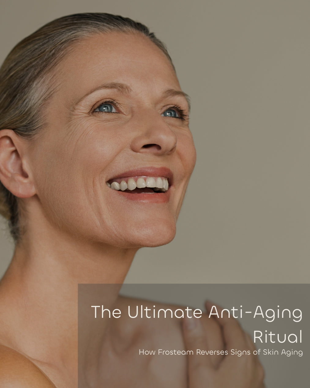Smiling woman showing Frosteam anti-aging ritual results