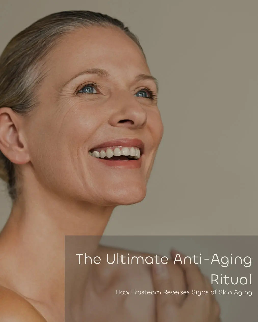 Smiling woman showing Frosteam anti-aging ritual results