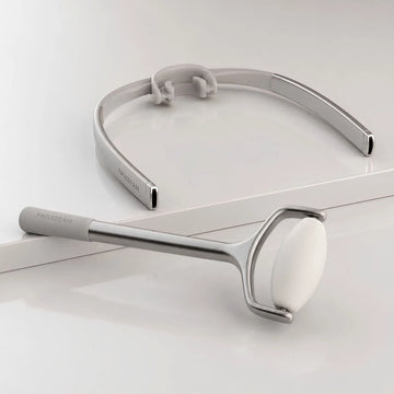 Frosteam Face Roller and Dive Breather luxury facial skincare tools on a minimalist light gray studio background.