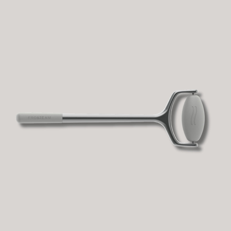 Frosteam facial massage tool top view – sleek design for precise face massage