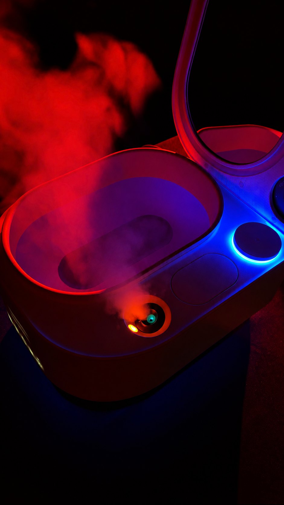 Frosteam Harmony with nano-ionic steam rising under red and blue light, mirrored lid open