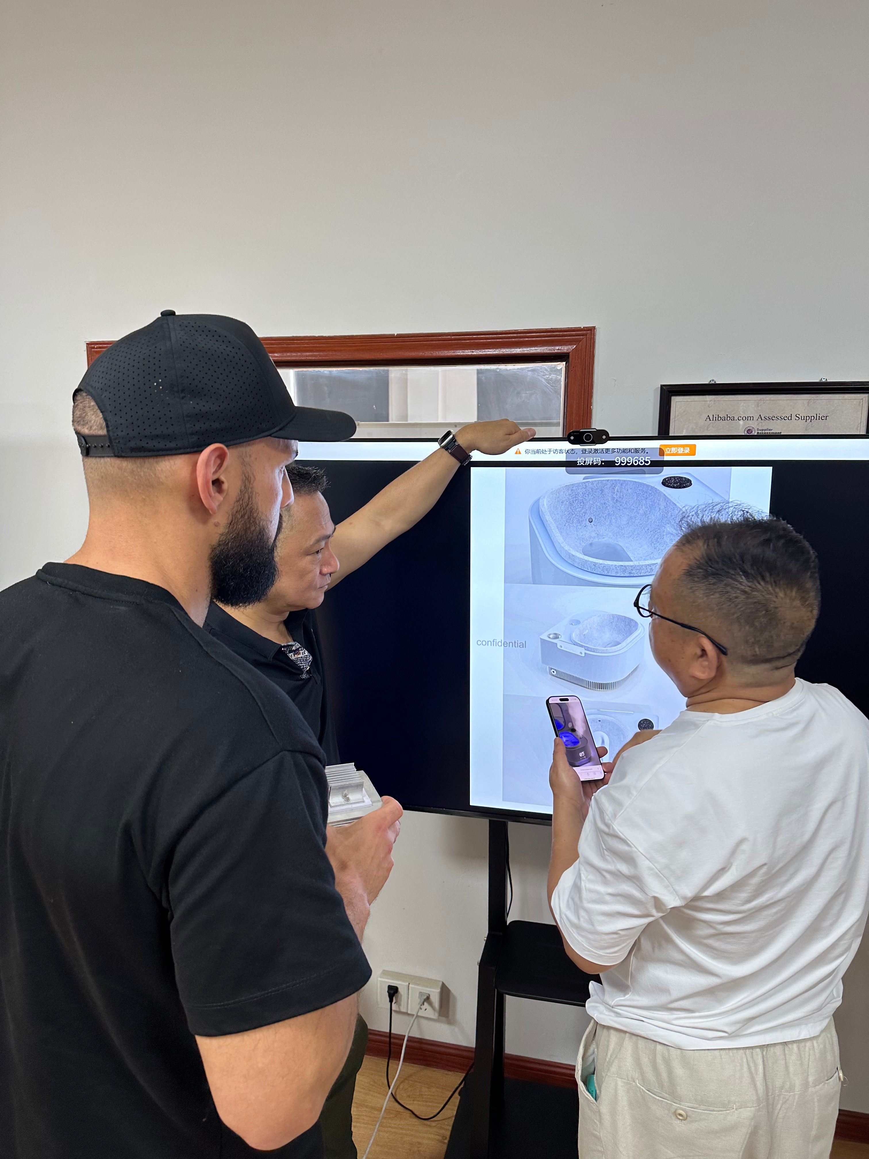 Frosteam team reviewing product engineering and manufacturing details during the development and production planning process