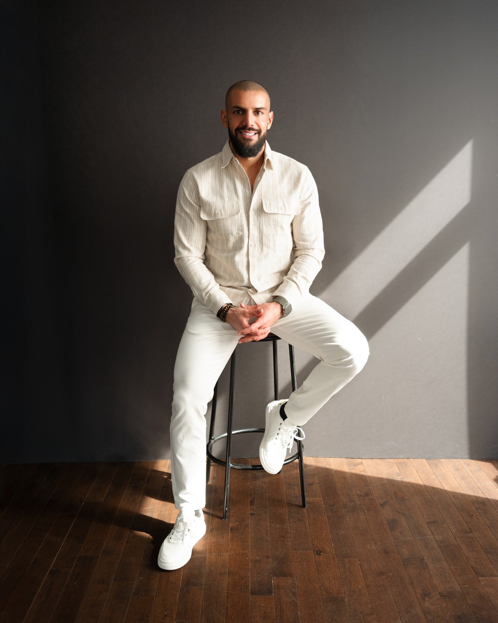 Ritchie Deraiche, Founder of Frosteam, seated portrait representing the vision behind the premium 3-in-1 skincare and wellness device