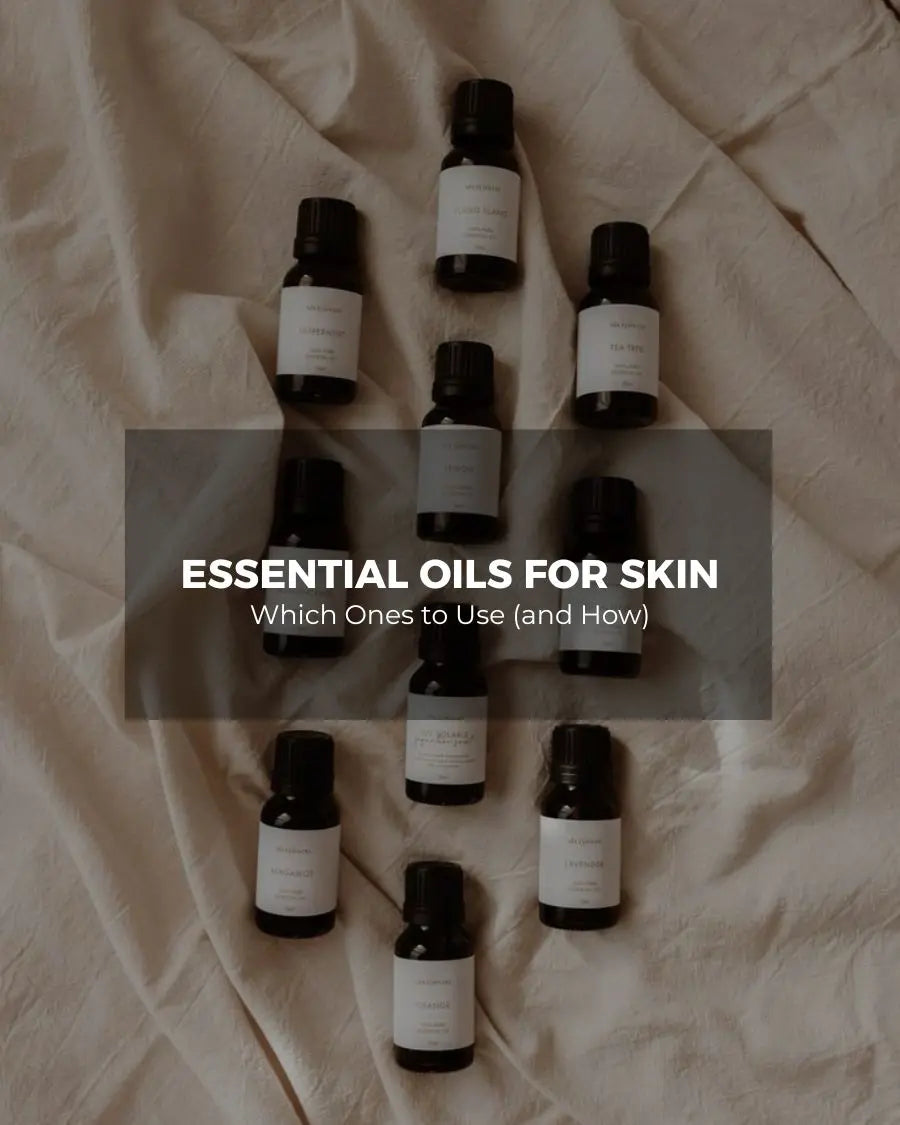 Flat lay of essential oil bottles on linen fabric, cover image for the guide on essential oils for skin
