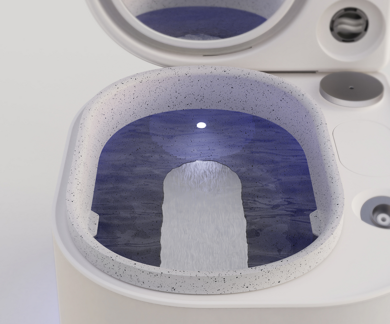 Close-up of the Frosteam aromatherapy diffuser during a facial steam ritual