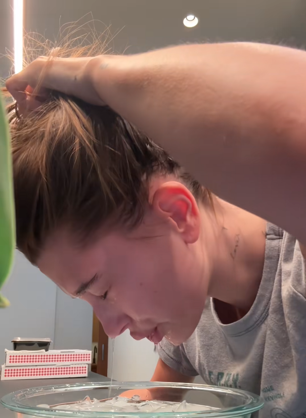 Hailey Bieber practicing facial cold plunge to depuff skin and enhance glow, inspired by celebrity cold therapy skincare rituals