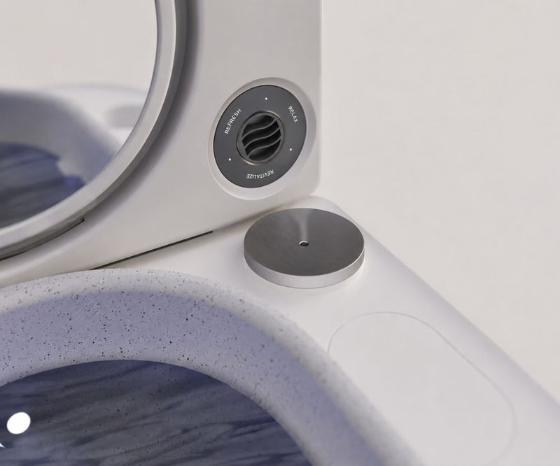 Frosteam Harmony aromatherapy diffuser cap and speaker grille at the hinge column