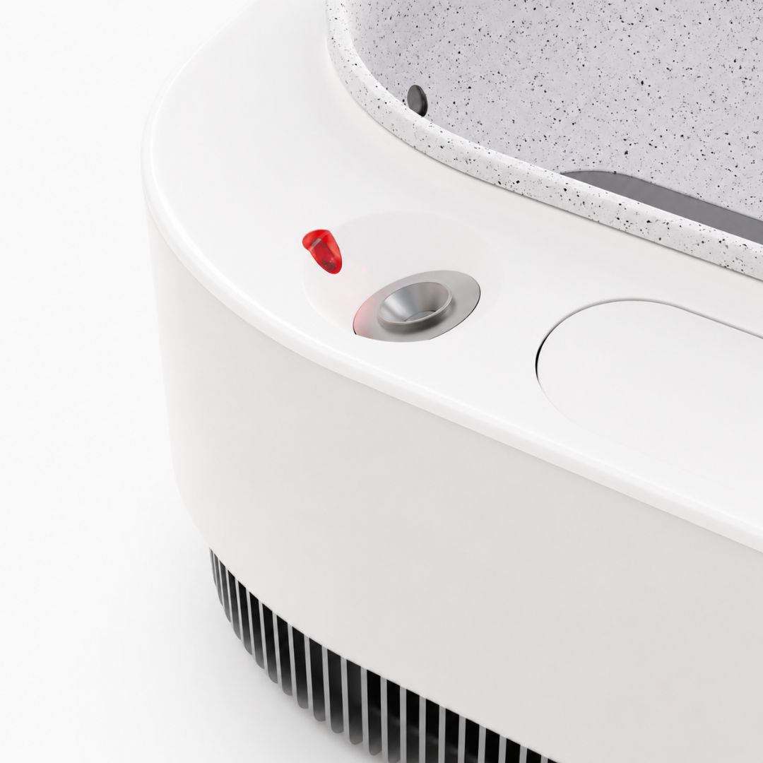 Close-up of the Frosteam Harmony facial device showing the nano steam outlet, cold plunge basin and premium aluminum details.
