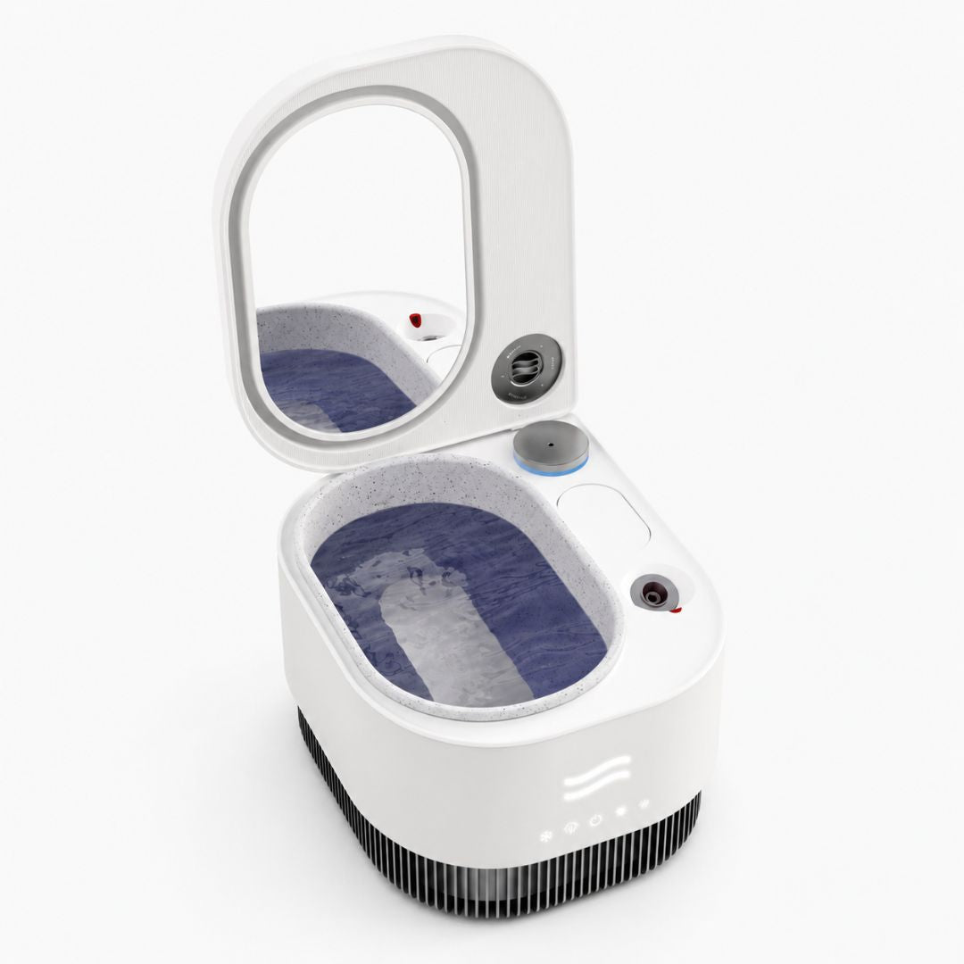 Three-quarter view of the Frosteam Harmony 3-in-1 facial device with open mirror lid, cold water basin and aromatherapy compartment.