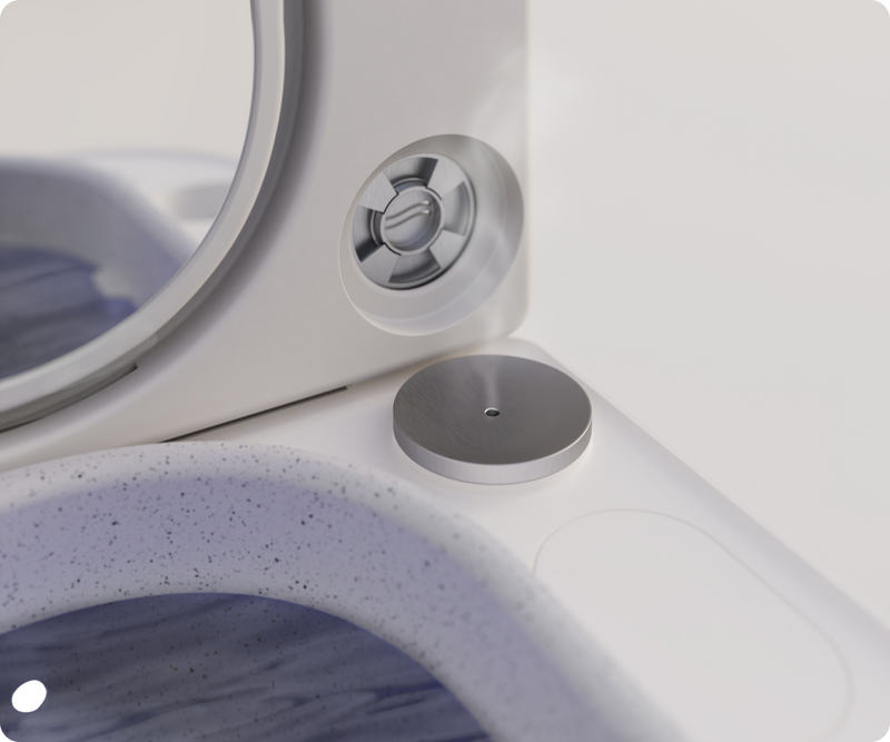 Close-up of Frosteam nano steam nozzle and cold plate system showing precision facial steam and cooling technology