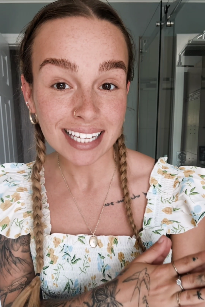 Woman sharing her personal experience and skincare routine results after using Frosteam facial steam and cold therapy at home